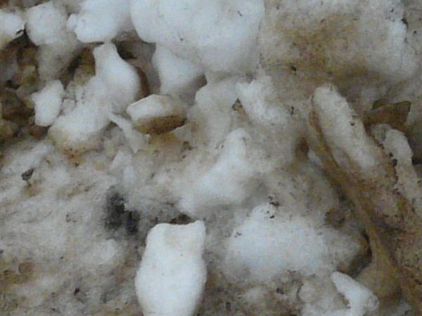 Dirty snow texture, formed into large irregular clumps.